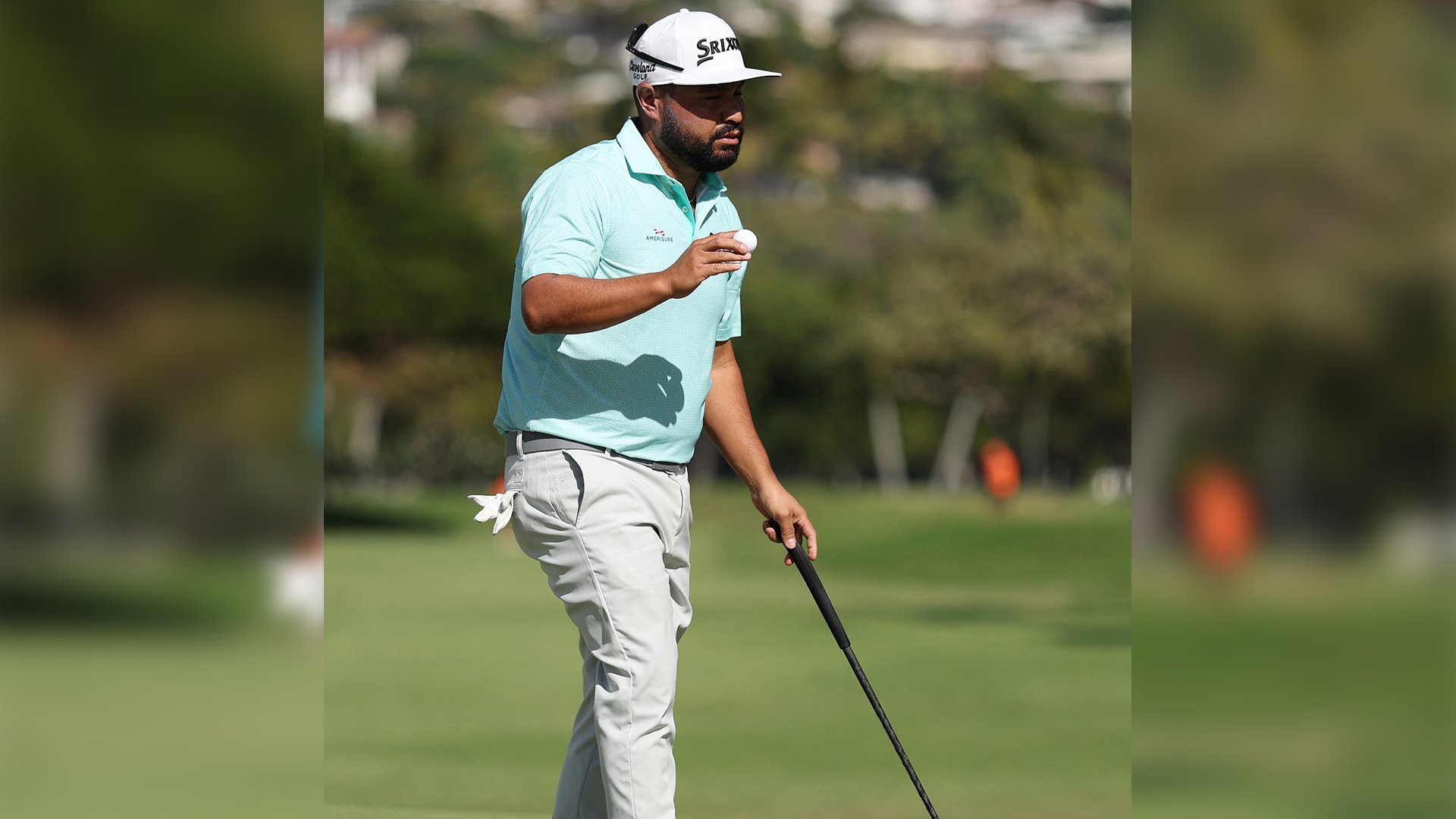 Spaun shoots 65, grabs Sony Open lead