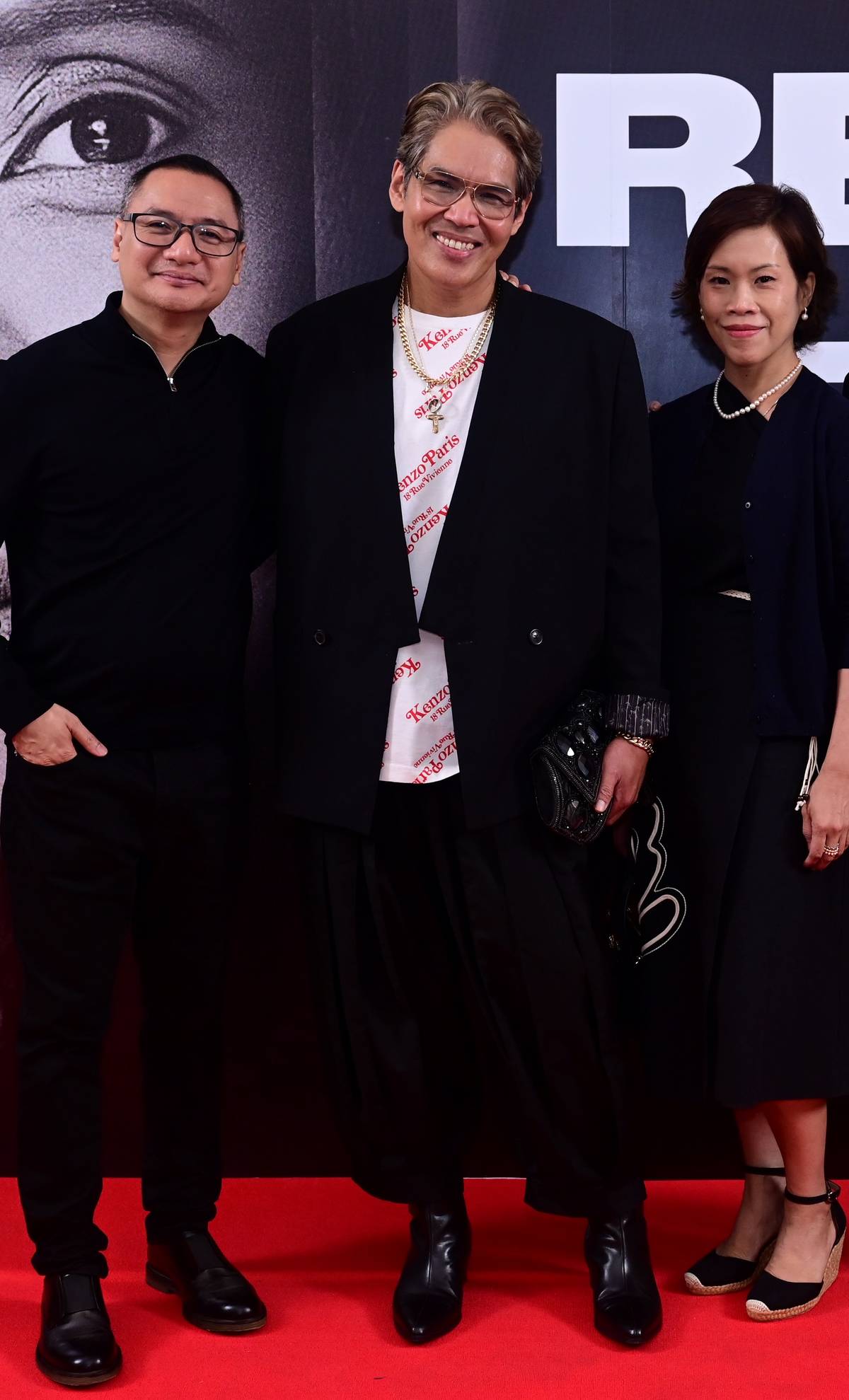 ‘Into The Woods’ producers John and Joanna Echauz flank Tony Award-winning creative visionary and co-producer Clint Ramos.