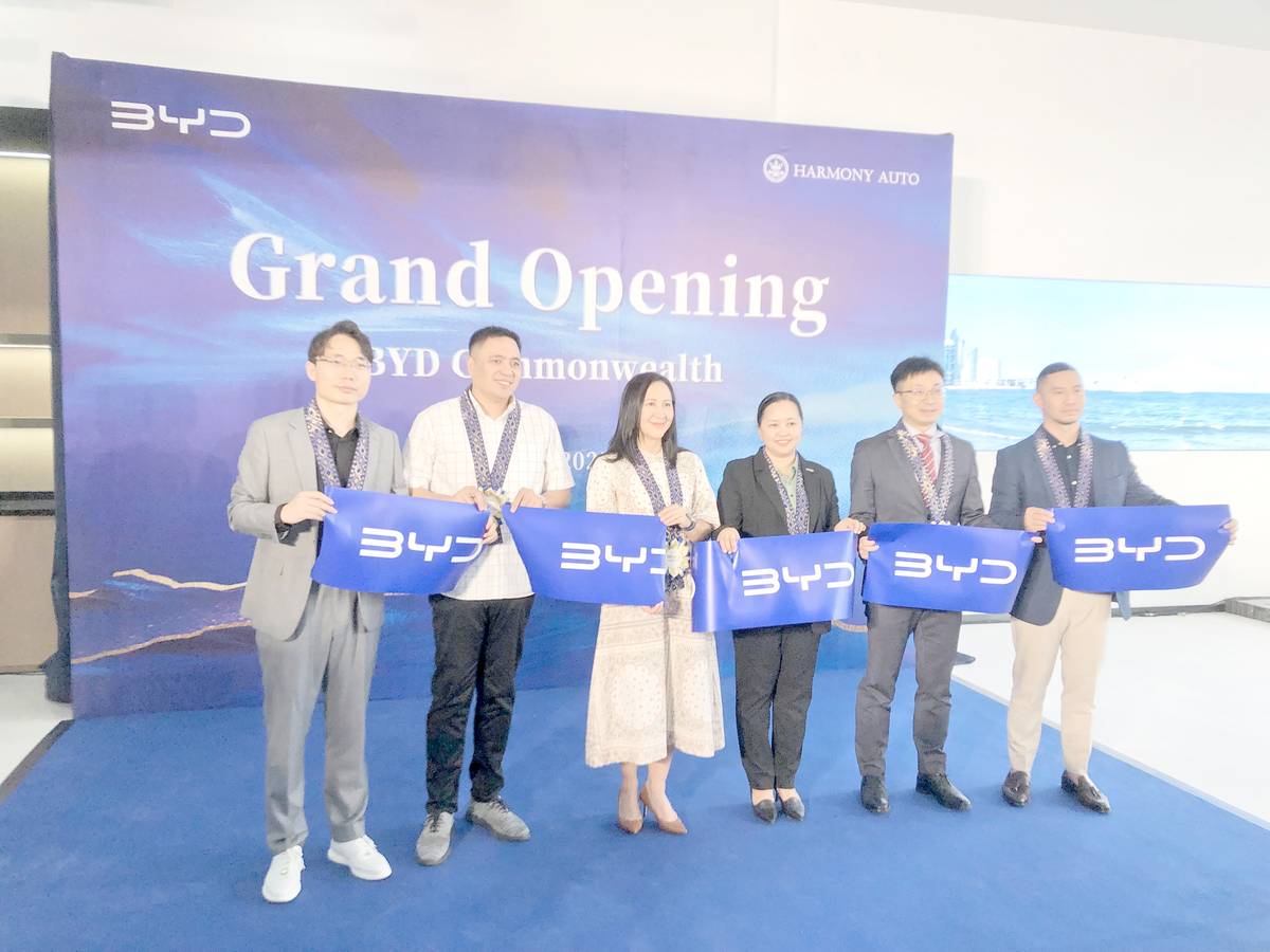 DISTINGUISHED guests and company representatives join the ribbon-cutting ceremony at the grand opening of BYD Commonwealth. Shown are: (from left) Fred Feng, county head of Harmony Auto Philippines; Erroll Duenas, BYD aftersales and network director of ACMobility Philippines; Maria Josefina ‘Joy’ Belmonte Alimurung, mayor of Quezon City; Lovelyn Labrador, deputy general manager of BYD Philippines; Yang Guoliang, minister councilor of the  Chinese Embassy in the Philippines and Miguel Palma, general manager of Harmony Auto Fairview and Commonwealth.