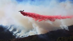 Firefighters race to beat LA blazes as winds grow 