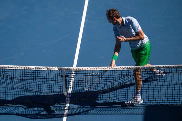 SHAKY START: Racket-smashing Daniil survives big scare