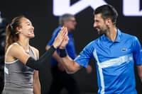 Djokovic makes history; Zheng stunned in Melbourne