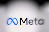 This photo illustration created on January 8, 2025 in Frankfurt am Main, western Germany, shows the media giant Meta's logo displayed on a smartphone.