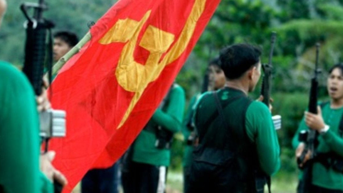 NPA guerrillas yield high-power U.S. and Russian-made assault rifles in exchange for cash