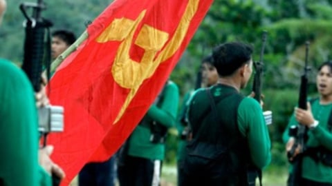 NPA guerrillas yield high-power U.S. and Russian-made assault rifles in exchange for cash