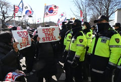 South Korean president arrested, invokes right to remain silent