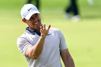 Rory McIlroy gets frustrated after falling nine shots behind leader Ewen Ferguson in the Dubai Desert Classic in the United Arab Emirates.