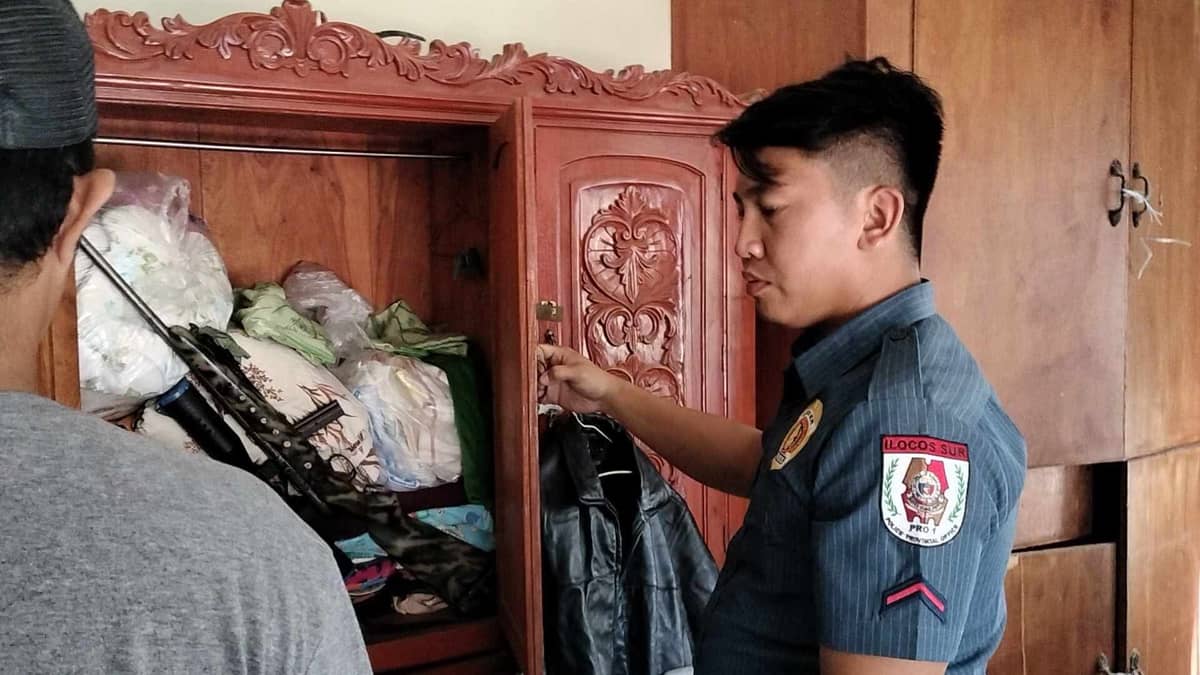 POLICE show the seized firearms and ammunition from the suspect in San Juan, Ilocos Sur.