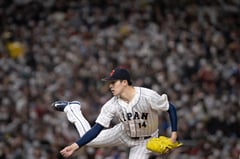 Prized Japanese pitcher joins Dodgers