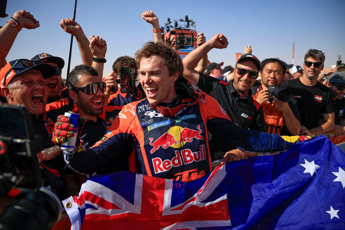Daniel Sanders celebrates with supporters after winning the Dakar Rally 2025.