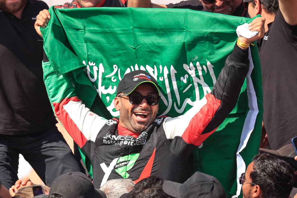 Yazeed Al Rajhi celebrates after winning the Dakar Rally 2025 in the car category.
