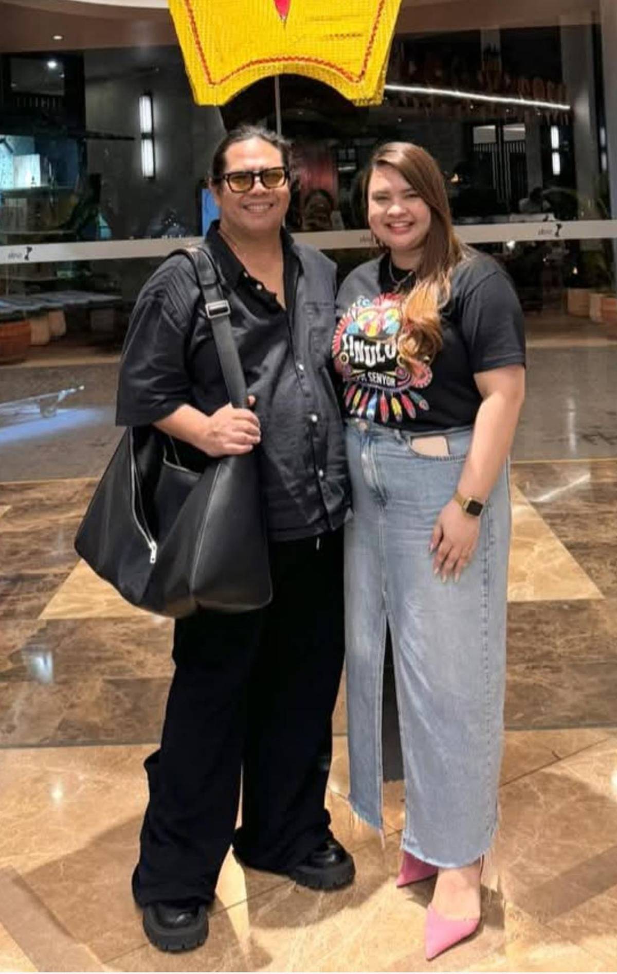 Fashion designer Dexter Alazas with Seda Hotel’s Gia Mayola.
