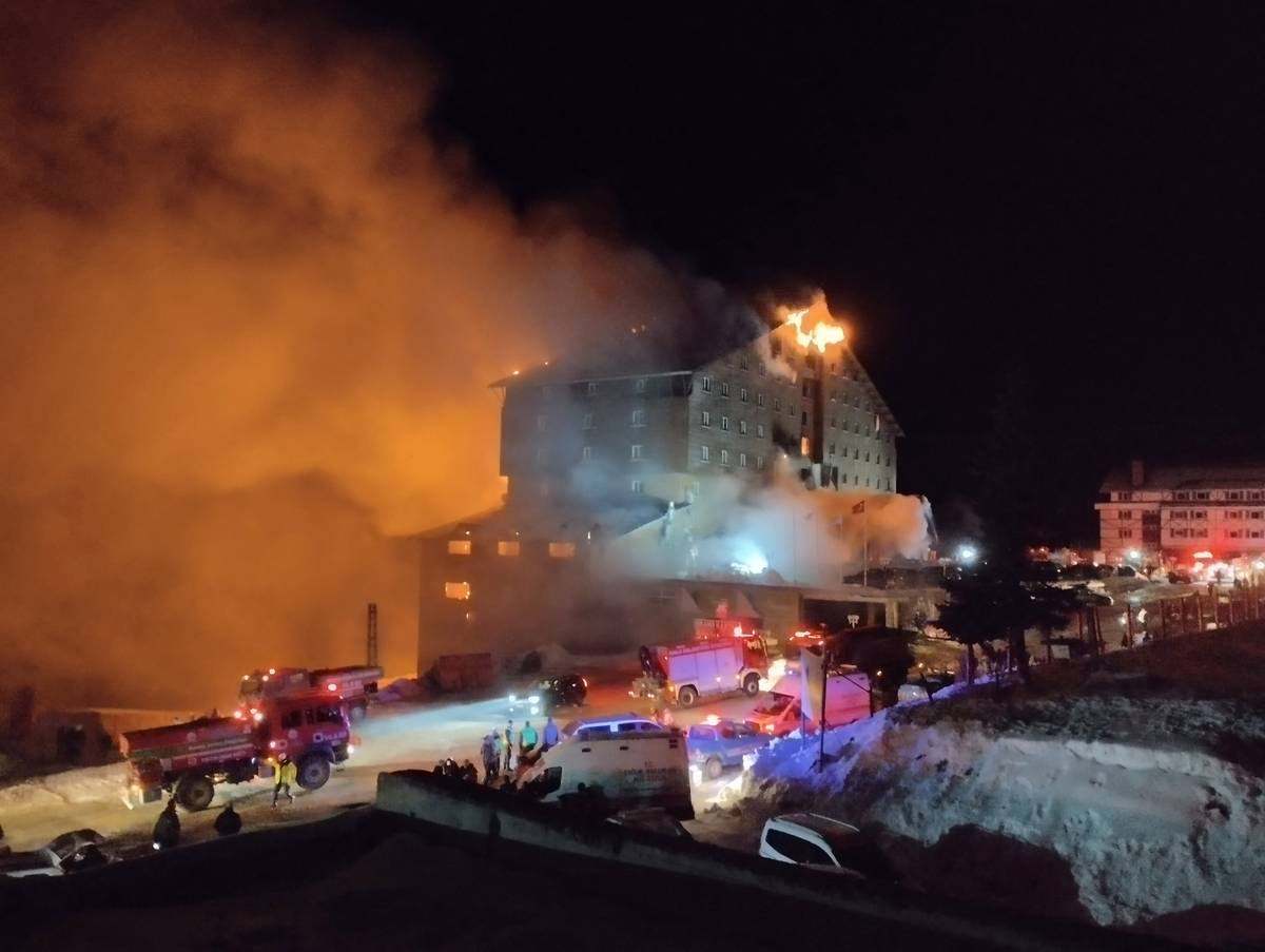 This handout photograph released by the Demiroren News Agency (DHA) on 21 January 2025 shows a fire on the fourth floor of the 11-storey hotel in Bolu's Kartalkaya ski resort.