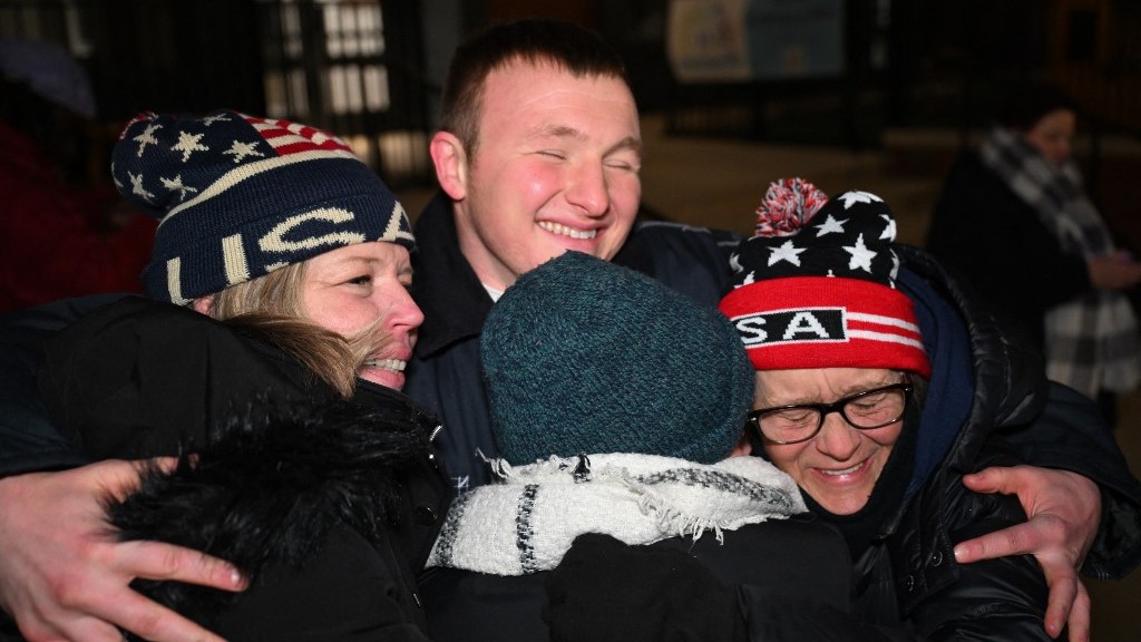 Gregory Purdy, a 6 January defendant, hugs friends he calls his "Patriot sisters" after his release from the DC Central Detention Facility where he was incarcerated for the 2021 attack on the Capitol, in Washington, DC, on 21 January 2025. On his first day in office, US President Donald Trump signed pardons for more than 1,500 people charged in the 6 January 2021 attack on the Capitol by his supporters trying to overturn the 2020 election.