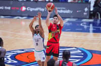 Juami Tiongson flexes his shooting prowess during San Miguel’s 116-113 victory over Converge on Friday in their PBA Commissioner’s Cup game at the Ynares Center in Antipolo.