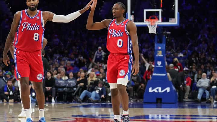 Paul George (left) and Tyrese Maxey join hands for 59 points to power the Philadelphia 76ers past the league-leading Cleveland Cavaliers, 132-129, in their NBA regular season game on Friday.
