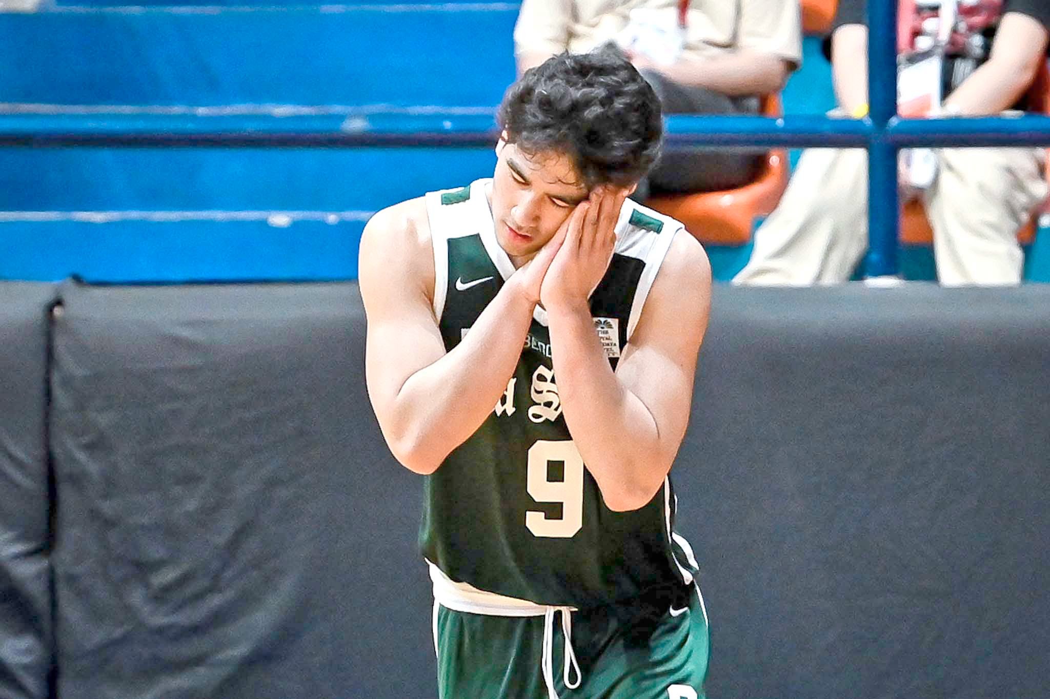 Kieffer Alas celebrates after leading De La Salle Zobel to a 73-65 overtime win over Ateneo de Manila University in the UAAP Season 87 boys basketball tournament.