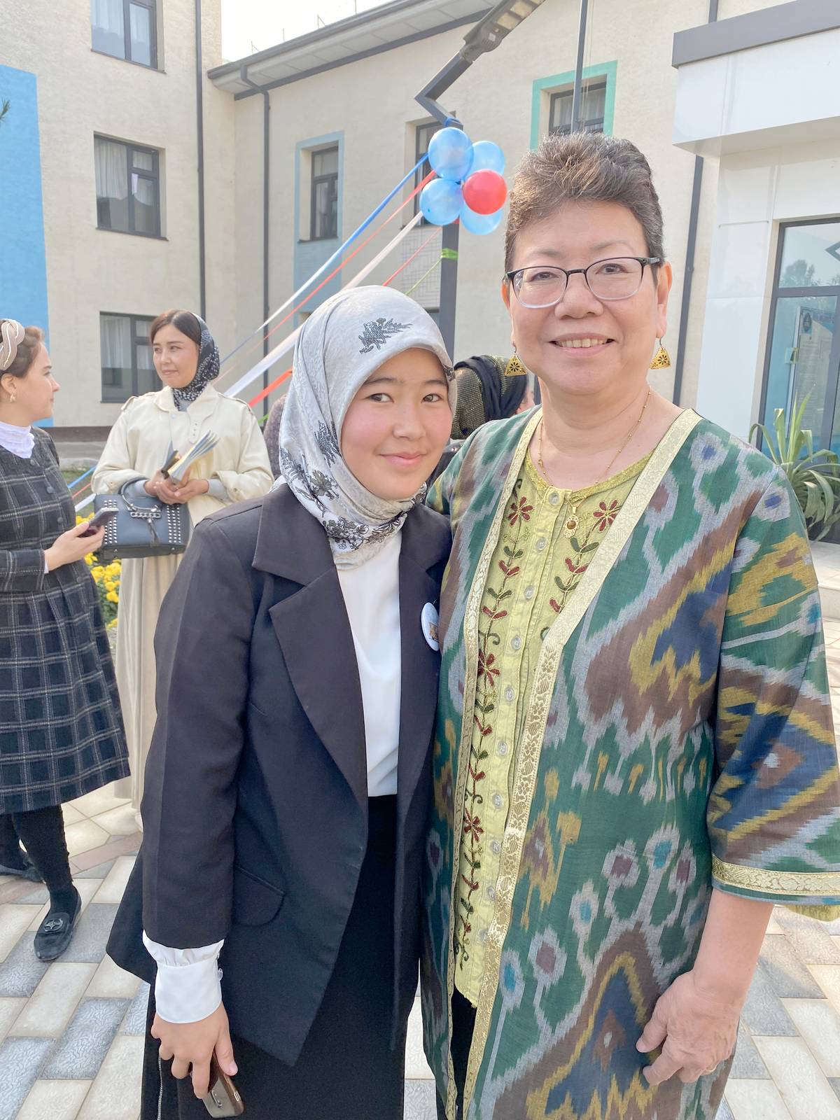 The author with a local student