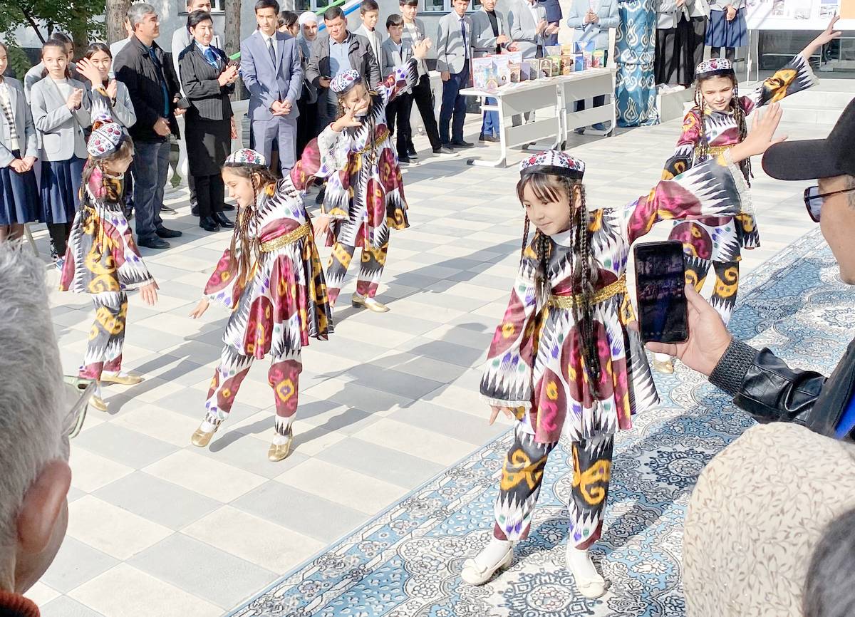 School children showcasing a traditional Uzbek dance