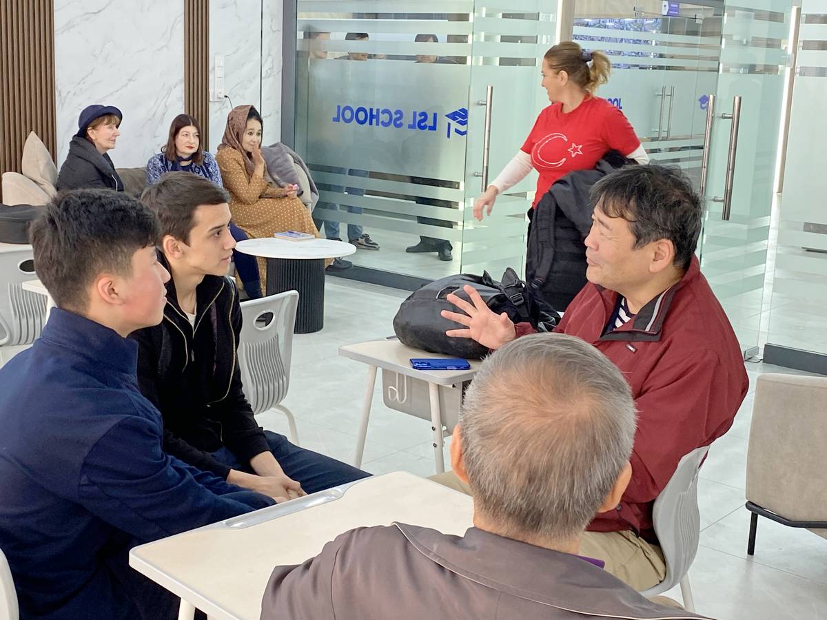 Yusuke interacting with students at the LSL School in Namangan