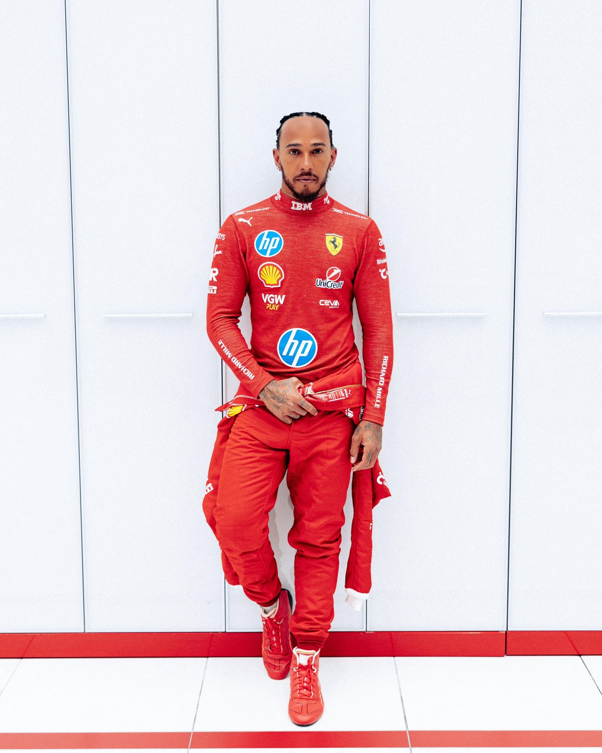 Lewis Hamilton, wearing the Ferrari suit, says driving a Ferrari for the first time was one of the best feelings of his life.