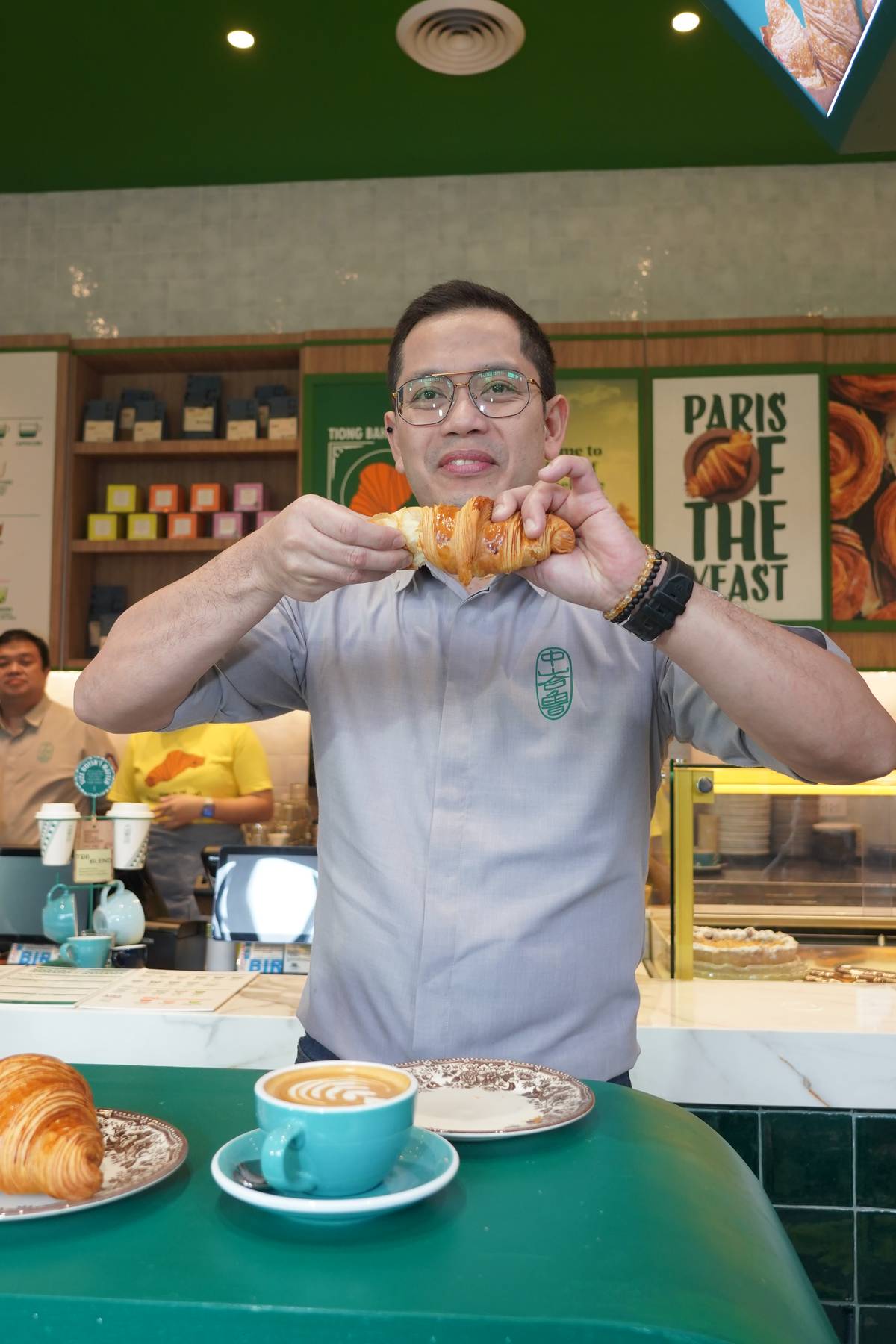 To officially welcome Tiong Bahru Bakery into our neighborhood, guests were invited to gently twist their croissants to break them, pull them apart, and dunk them in coffee before taking a bite.