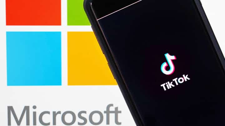 In this photo illustration, a mobile phone featuring the TikTok app is displayed next to the Microsoft logo on August 03, 2020 in New York City. Under threat of a U.S. ban on the popular social media app, it has been reported that Microsoft is considering taking over from Chinese firm ByteDance. (Photo Illustration by Cindy Ord/Getty Images)
Cindy Ord / GETTY IMAGES NORTH AMERICA / Getty Images via AFP