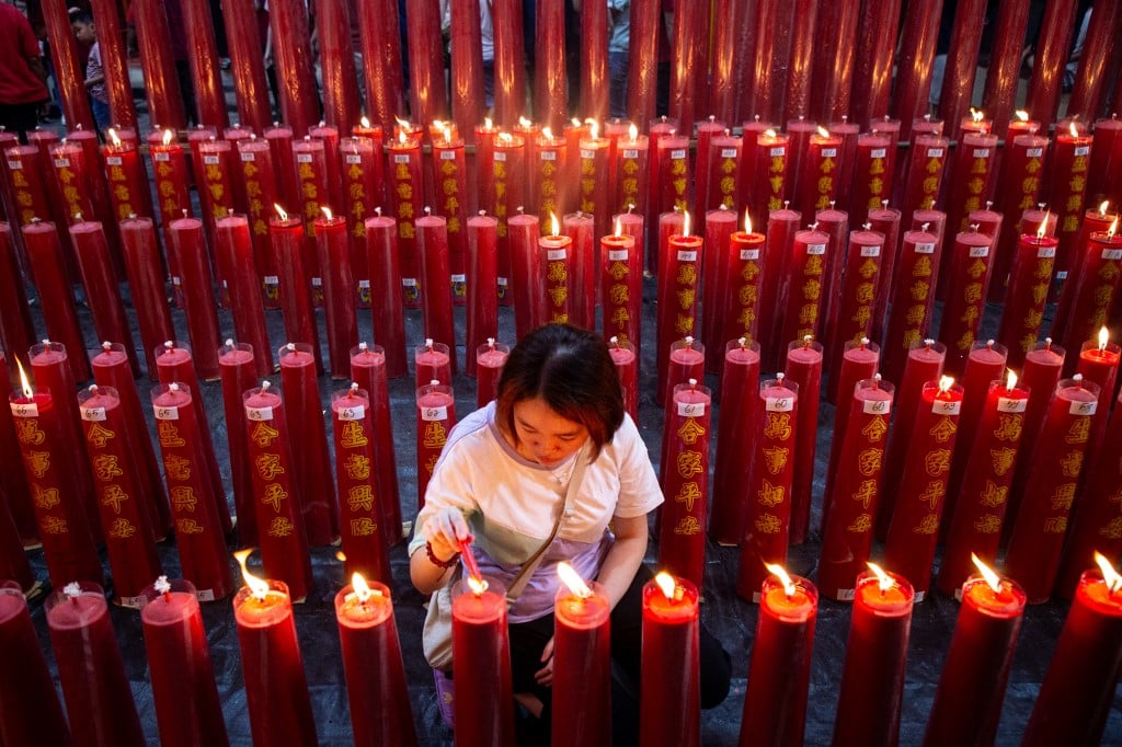 Prayer and dance: Hundreds of millions in Asia celebrate Year of the Snake