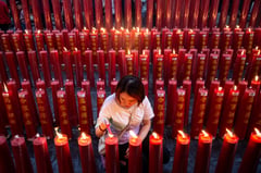 Prayer and dance: Hundreds of millions in Asia celebrate Year of the Snake