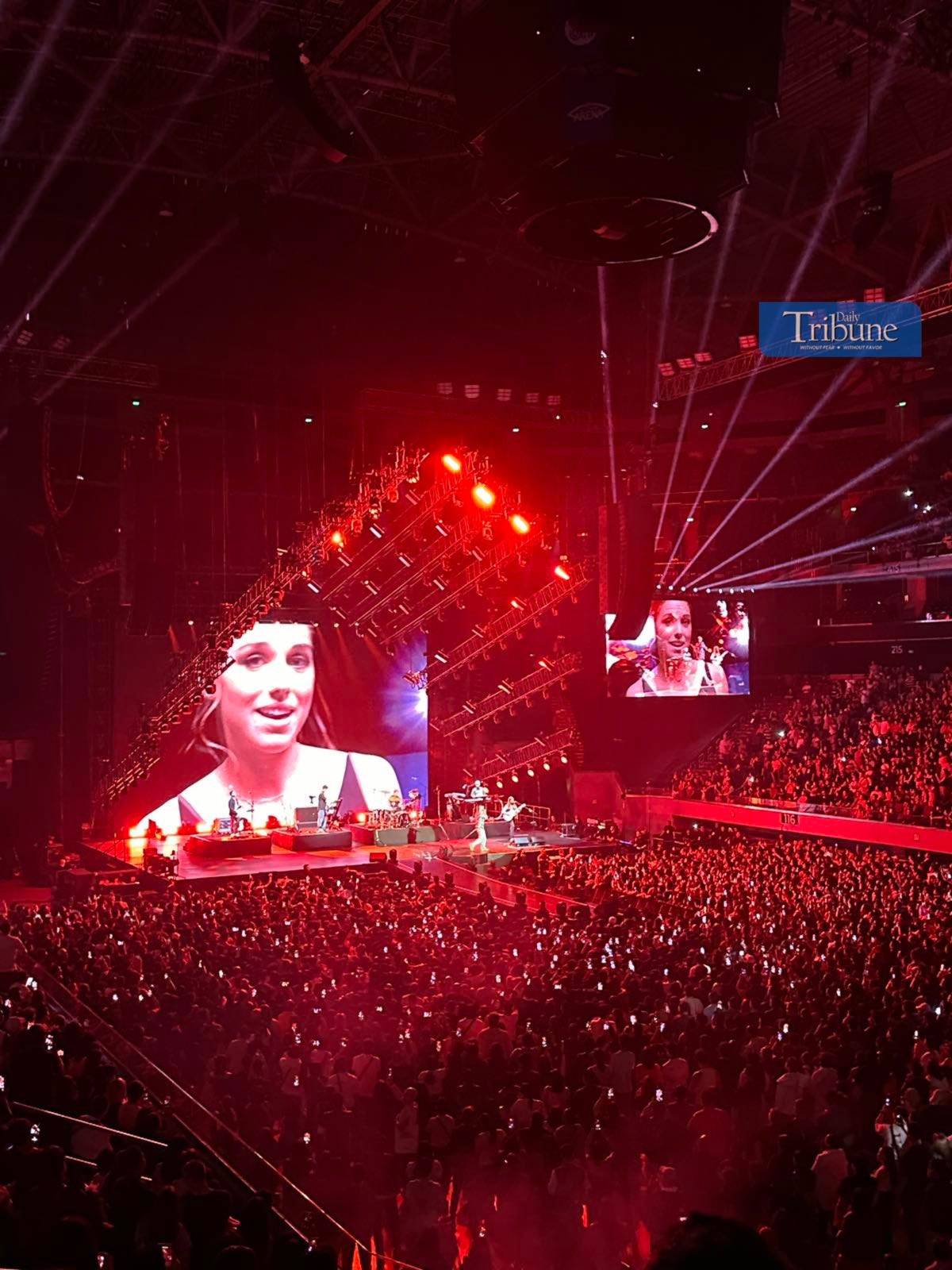 Emotional moment: Concertgoers light up the arena as Memories plays in tribute to lost loved ones.