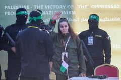 Hamas hands over woman hostage