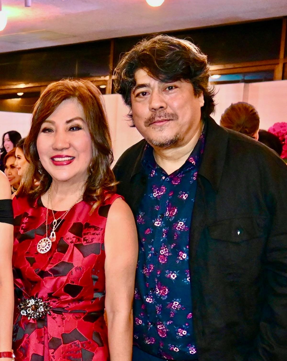Connie Haw and artist Ivan Acuña.