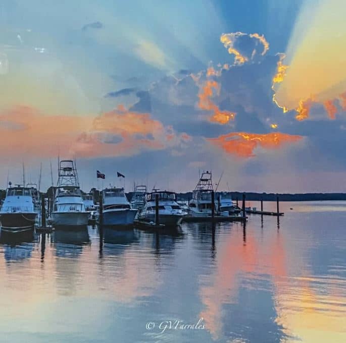 Blush skies with orange glow: Sunset Over Belmar Marina, NJ 10” x 10” by Gee Farales, 2022.