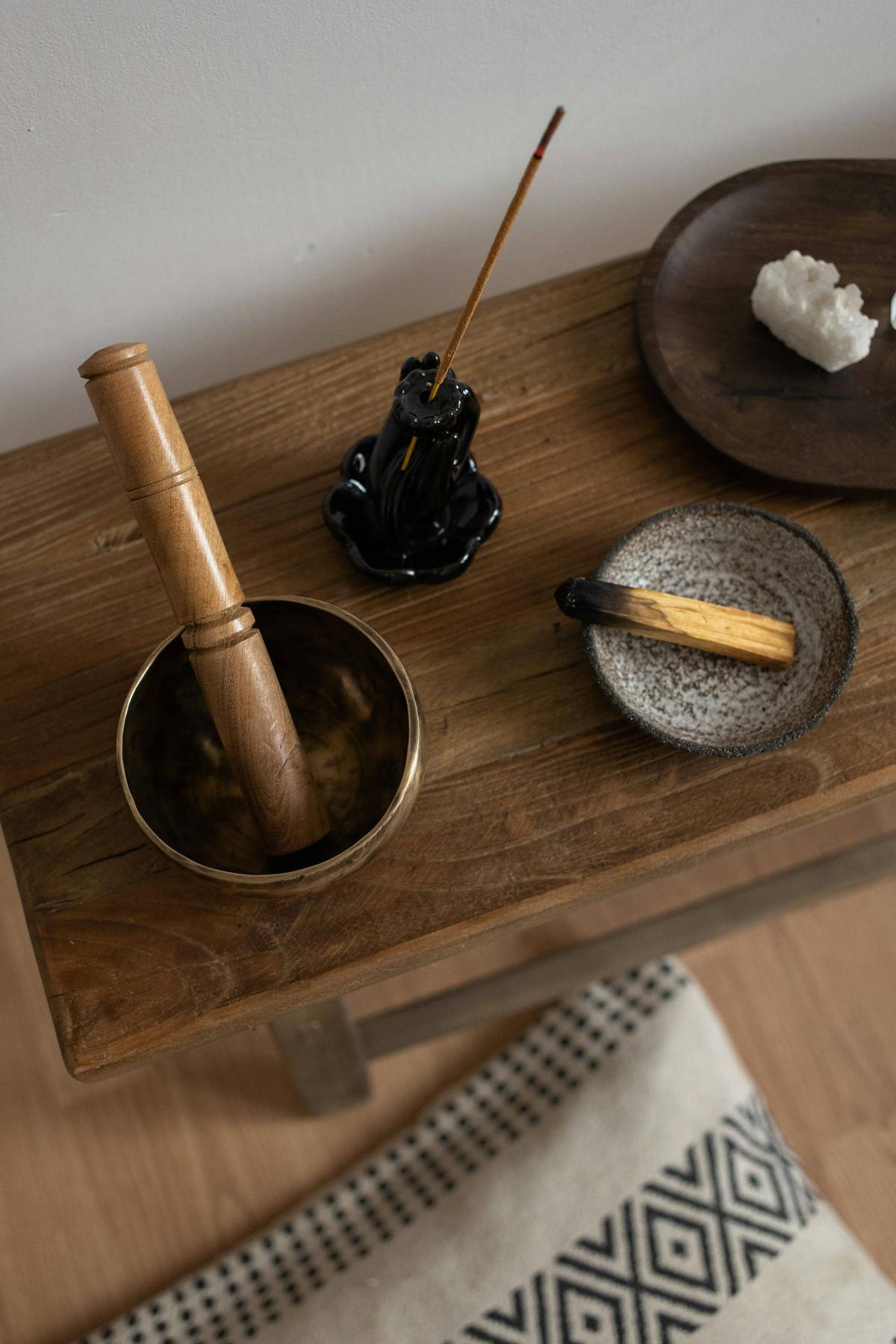 smudge with sage or palo santo, or use crystals like black tourmaline or selenite to absorb negative energy.