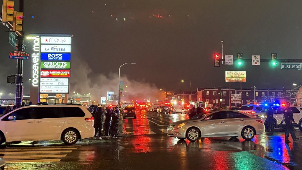 Small plane crashes in Philadelphia, sparking fire on the ground