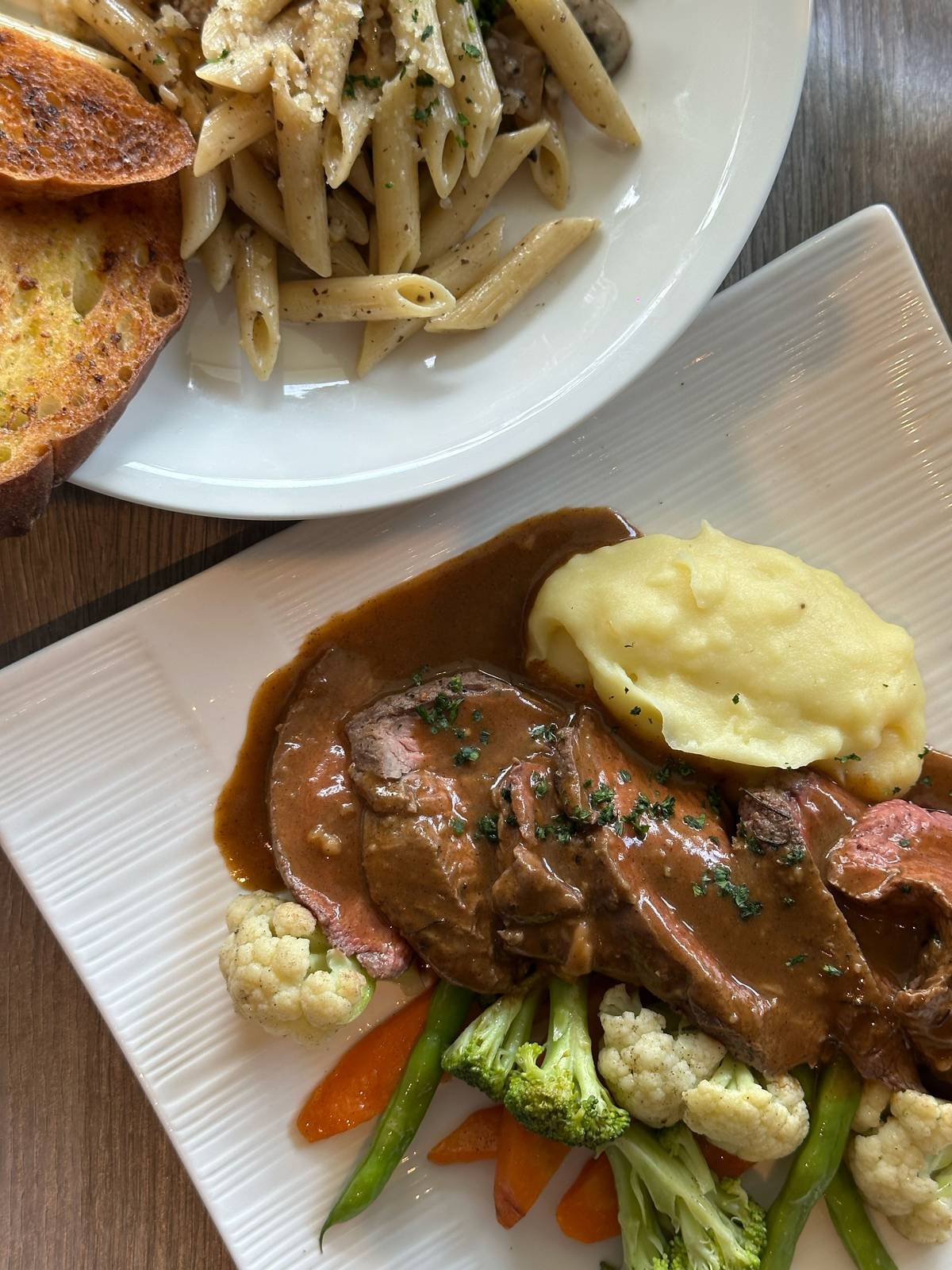 Western fare-like Wild Mushroom-Truffle Al Penne and Beef Tenderloin Steak.