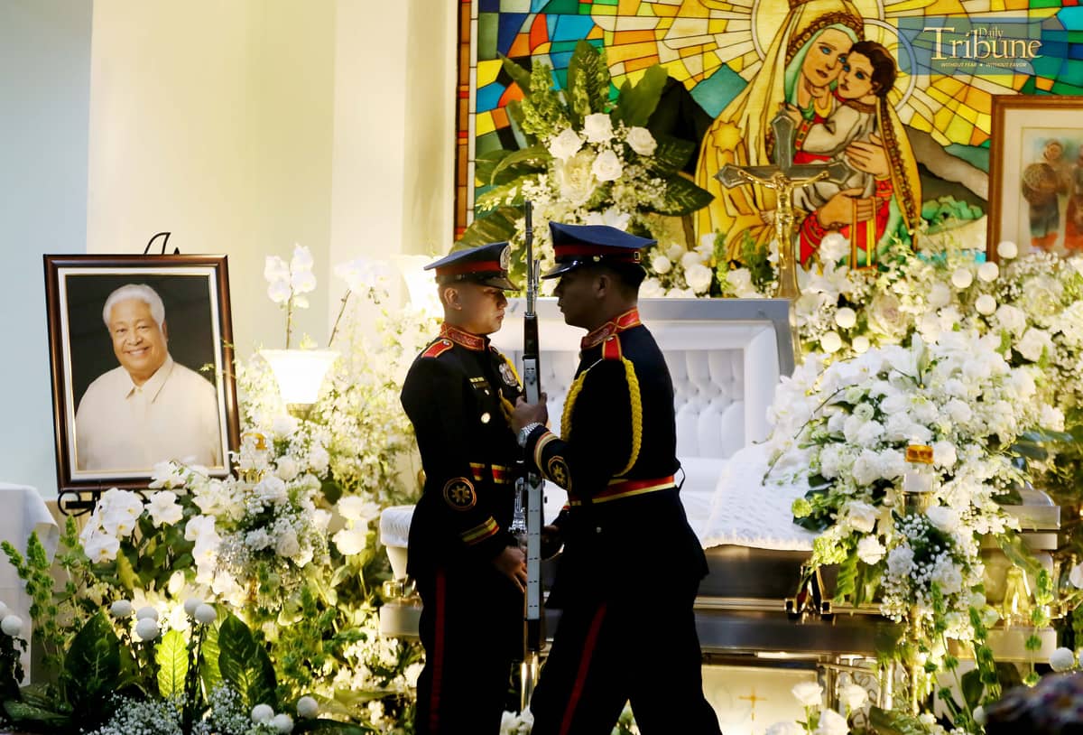 Honor guards stand beside the casket of Albay First District Representative and Liberal Party President Edcel Lagman