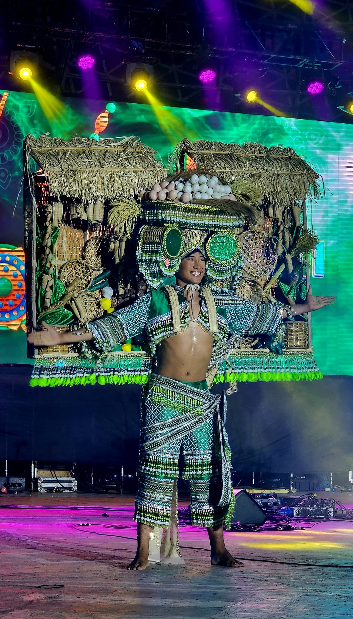 The elaborate costume of the festival king of San Isidro, depicting agriculture and other products.