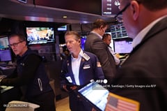 Stock markets sink, dollar rallies as Trump imposes tariffs