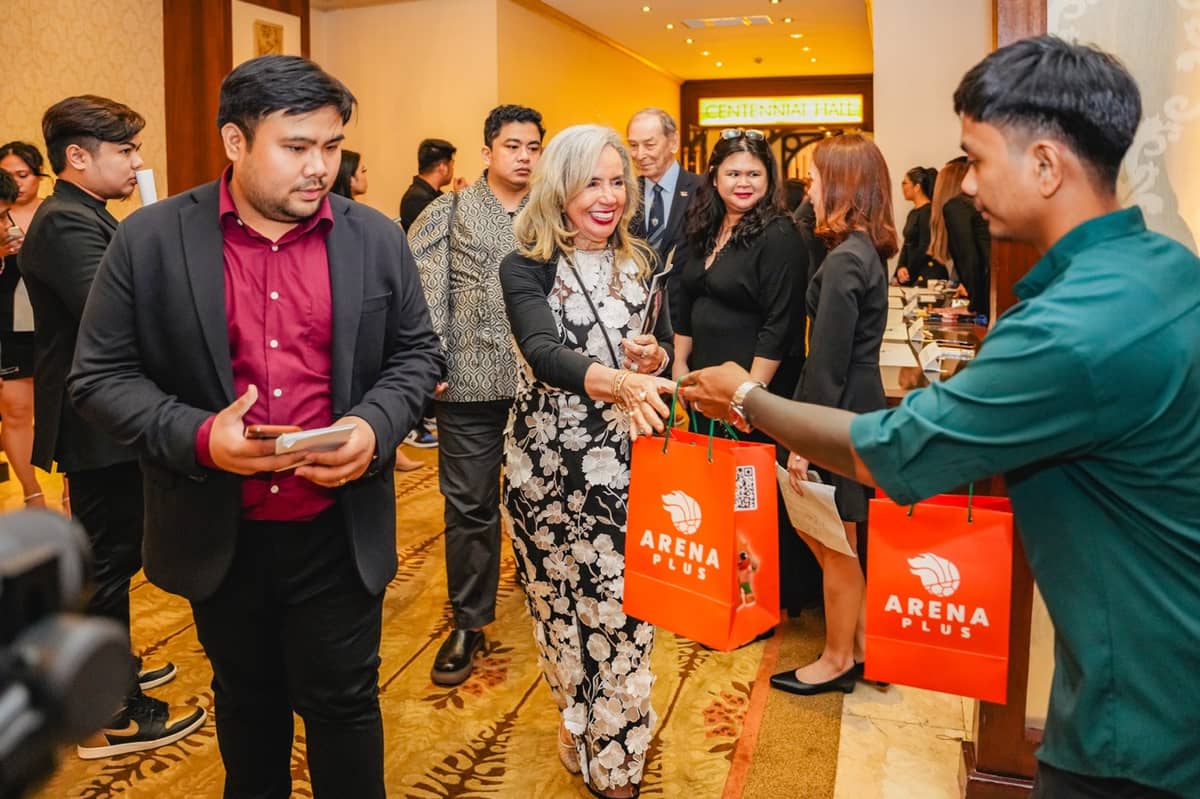 LOOK: Cynthia Carrion, president of the Gymnastics Association of the Philippines, enjoys premium treats from ArenaPlus during the PSA Awards.
