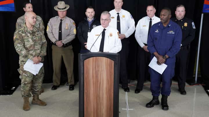 John Donnelly, chief of Washington DC Fire and EMS, speaks during a Unified Command press conference at Reagan National Airport as the search continues at the crash site of the American Airlines plane on the Potomac River in Arlington, Virginia. Operations to salvage the wreckage from a deadly collision between a US Army helicopter and a passenger jet continued as rescuers said 55 victims had so far been identified.