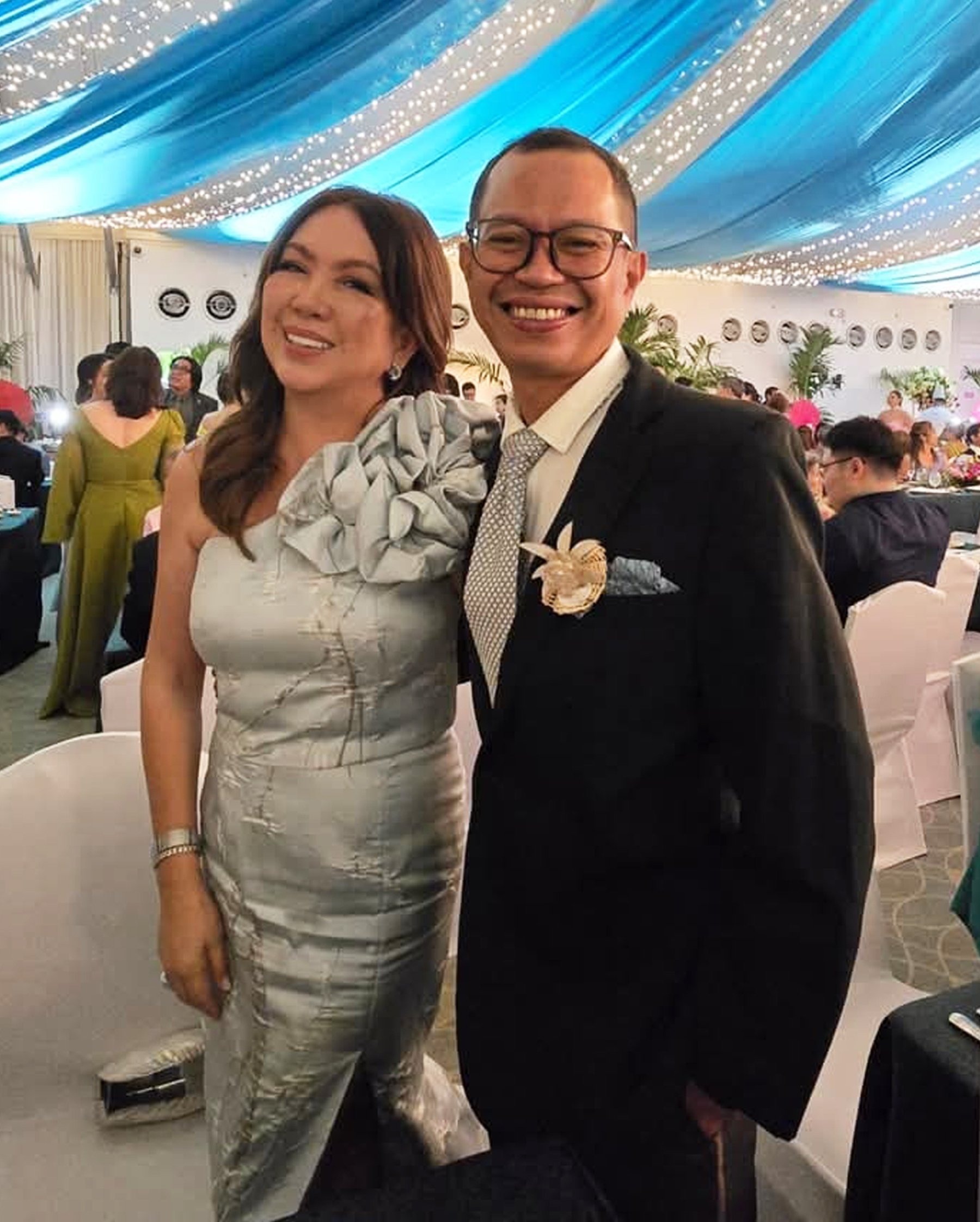 Iris Arcenas with Butch Carungay.