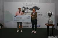Korean Minwook Gwon holds The Country Club Invitational trophy and a replica of the P2 million check after winning the flagship event of the Philippine Golf Tour last weekend. Also shown is PGT and TCC general manager Colo Ventosa.