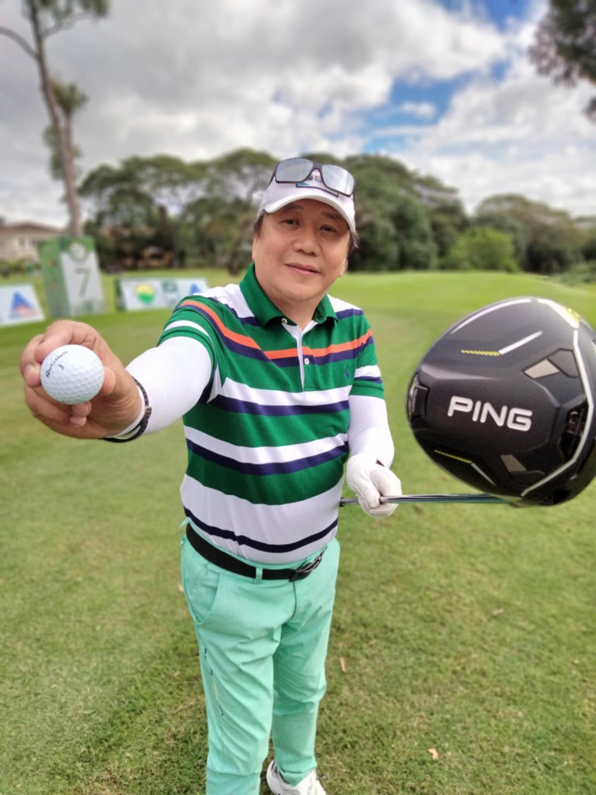 LEONIDES ‘Boy’ Canlas wins a brand-new BYD car after making a holein-one at the sixth hole of the Alabang Country Club.