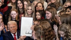 Trump signs order barring trans athletes from women's sports