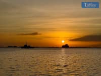 A vibrant sunset over Manila Bay