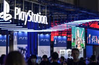 Visitors walk past the booth for Sony's PlayStation during the preview day for the annual Tokyo Game Show at Makuhari Messe in Chiba City, Chiba Prefecture on 26 September 2024.