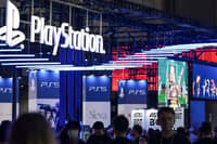 Visitors walk past the booth for Sony's PlayStation during the preview day for the annual Tokyo Game Show at Makuhari Messe in Chiba City, Chiba Prefecture on 26 September 2024.