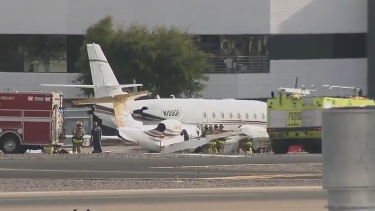 At least one dead as business jets collide at US airport 