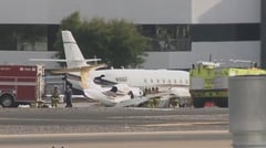 At least one dead as business jets collide at US airport 